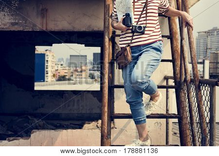 Woman traveler photographer holiday lifestyle trip