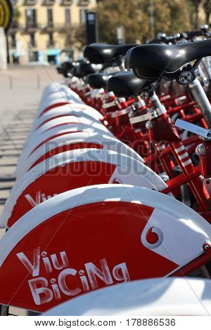 BARCELONA SPAIN March 14 2017: Bicing bicycle sharing bikes at a parking station.