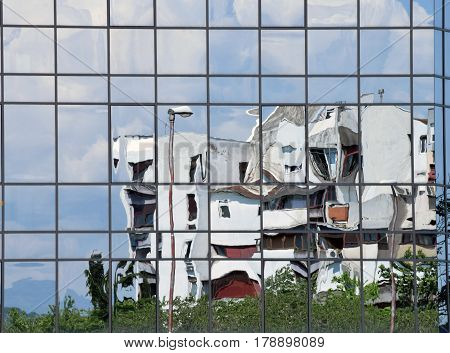 Reflections in Modern glass facade or cloudscape