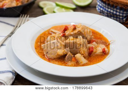 fresh tuna with paprika sauce on white plater