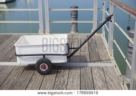 Cart used for carry fish from boats through the pier El Rompido Huelva Spain