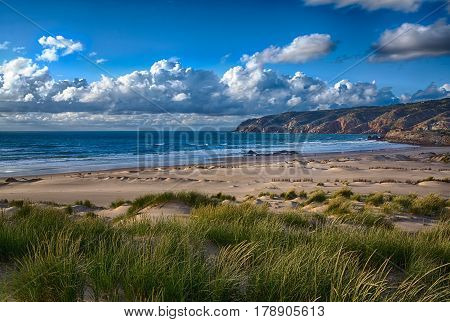 Cascais Portugal. 25 March 2017.View of Guincho beach in hazy day from the Cascais side on the N247 road in Portugal. Cascais Portugal. photography by Ricardo Rocha.