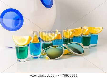 Glasses With Blue And Green Kamikaze, Glamorous Drinks, Mixed Drink Poured Into Shot Glasses, Sungla