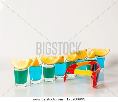 Glasses With Blue And Green Kamikaze, Glamorous Drinks, Mixed Drink Poured Into Shot Glasses, Sungla