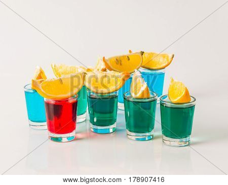 Glasses With Blue, Green And Red Kamikaze, Glamorous Drinks, Mixed Drink Poured Into Shot Glasses