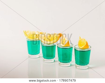 Glasses With Green Kamikaze, Glamorous Drinks, Mixed Drink Poured Into Shot Glasses