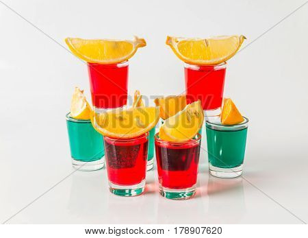 Glasses With Green And Red Kamikaze, Glamorous Drinks, Mixed Drink Poured Into Shot Glasses
