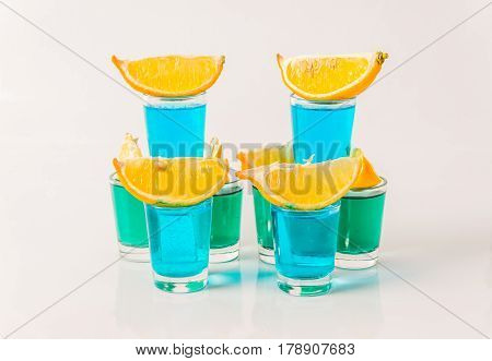 Glasses With Blue And Green Kamikaze, Glamorous Drinks, Mixed Drink Poured Into Shot Glasses