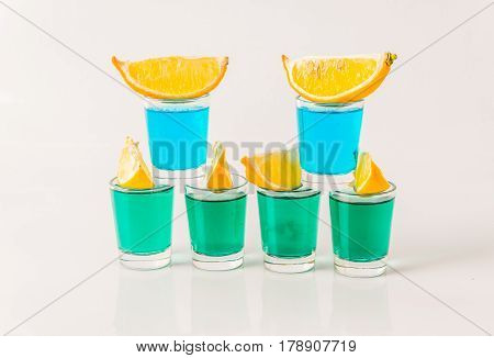 Glasses With Blue And Green Kamikaze, Glamorous Drinks, Mixed Drink Poured Into Shot Glasses