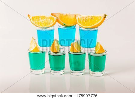 Glasses With Blue And Green Kamikaze, Glamorous Drinks, Mixed Drink Poured Into Shot Glasses