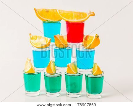 Glasses With Blue, Green And Red Kamikaze, Glamorous Drinks, Mixed Drink Poured Into Shot Glasses