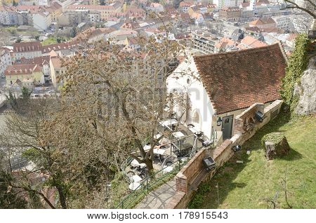 GRAZ, AUSTRIA - MARCH 20, 2017: Restaurant at the hill Schlossberg with views to the city in Graz the capital of federal state of Styria Austria.