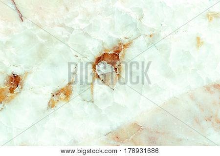 Close-up crushed marble stone texture background, Detailed real genuine marble structure from nature, Can be used for creating a marble surface effect to your designs or images.