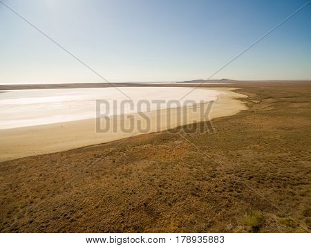 Aerial shot of Koyashskoe pink salt lake firth in Crimea