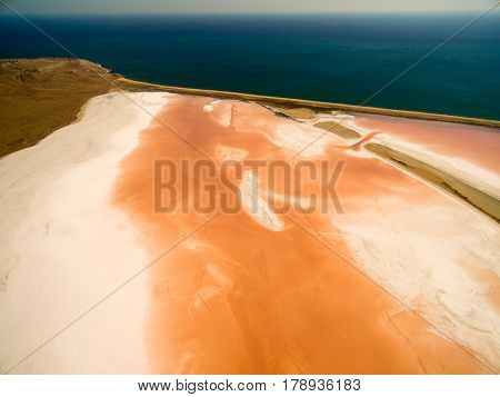 Aerial shot of Koyashskoe pink salt lake firth in Crimea