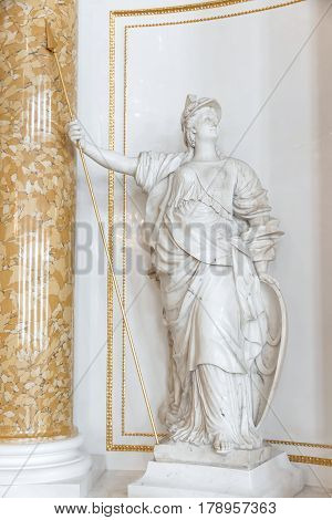 Symbols in arts - statue of Athena. Marble.