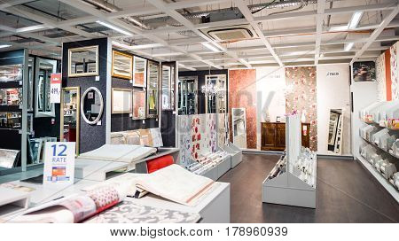 BUCHAREST ROMANIA - APR 1 2016: Interior of KIKA store selling diverse models of tapestry rug mat and other ready-to-assemble furniture kitchen appliances and home accessories