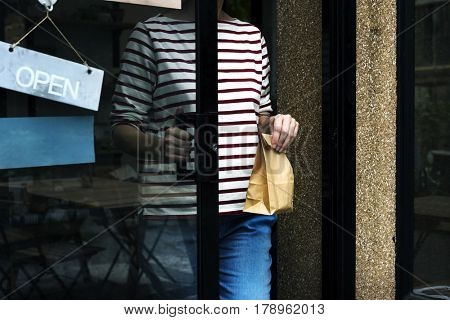 Woman shopping at cafe holiday