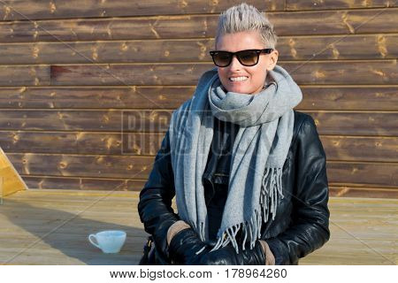 A beautiful girl looking at mountains inside artic circle