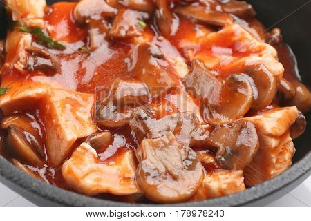 Chicken cacciatore in frying pan, closeup