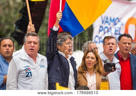 Quito, Ecuador - March 26, 2017: Guillermo Lasso, candidate for the CREO movement, along his binomial, Andres Paez during electoral campaign.