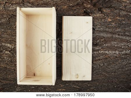 Wooden Box On A Woooden Background Opened