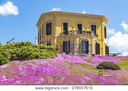 Alghero, Sardinia, Italy - April 25, 2016: Picturesque View Of Building Of Villa Mosca Hotel In Algh