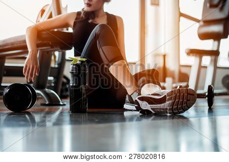 Rows Of Dumbbells In The Gym With Hign Contrast And Monochrome Color Tone.