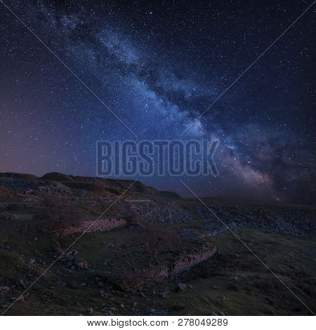 Stunning Vibrant Milky Way Composite Image Over Abandoned Foggintor Quarry In Dartmoor With Raking S