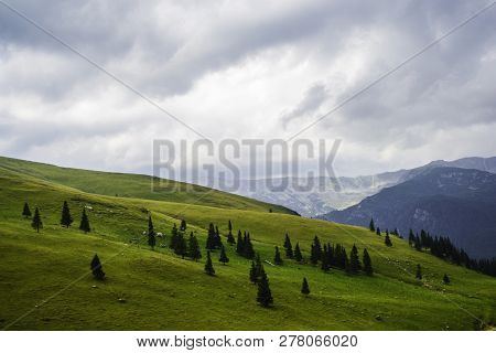 Landscape With Mountains, Hills And Cloudy Sky, Transalpina Road, Romania.