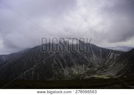 Landscape With Mountains, Green Hills And Cloudy Sky, Transalpina Road, Romania.