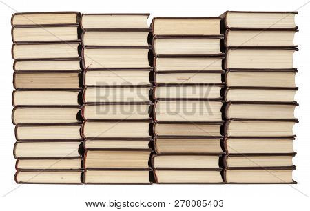 Stacks Of Old Books With Yellowed Pages Isolated On White Background. Library Or Bookstore Concept.