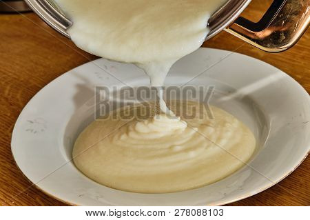 Preparing Semolina Puding - Pouring Semolina Pudding On Plate