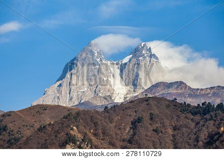 Two High Rocky Summits Of Ushba Mountain In Svaneti Region Of Georgia