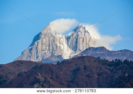 Two High Rocky Summits Of Ushba Mountain In Svaneti Region Of Georgia
