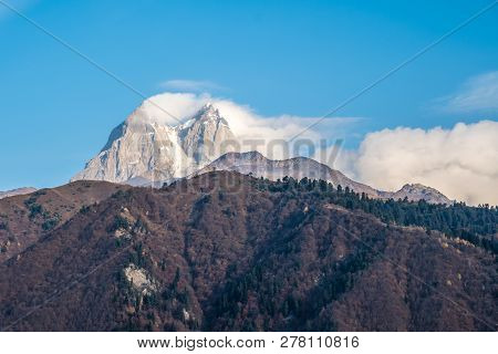 Two High Rocky Summits Of Ushba Mountain In Svaneti Region Of Georgia