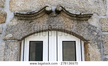 View Of A Decorative Architave Or Epistyle On Top Of A Door On An Old Building In Celorico Da Beira,
