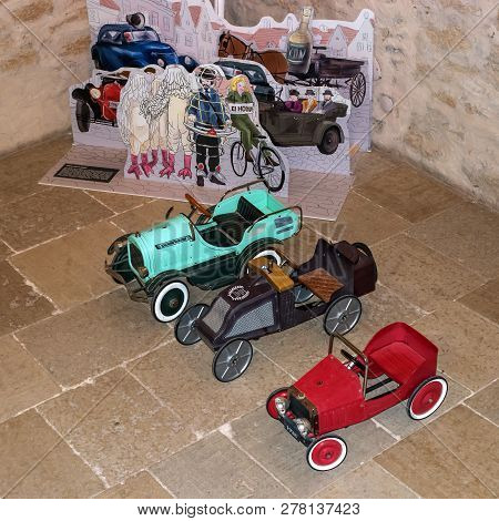 Narva, Estonia - November 17, 2018: Old Pedal Cars For Children. Rare Pre-war Toys. Exhibition In Na