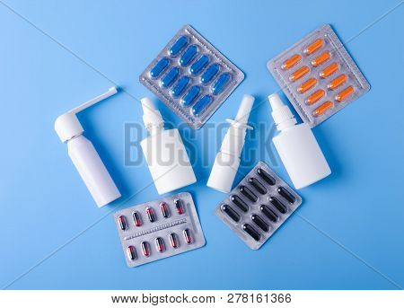 Pills Capsules Nose Throat Spray Thermometer Medicine Health On Blue Background Top View, Medical Ph