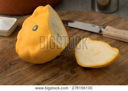 Fresh raw yellow pattison and a slice  