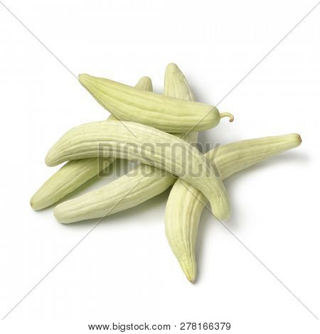 Heap of fresh raw Armenian cucumbers isolated on white background