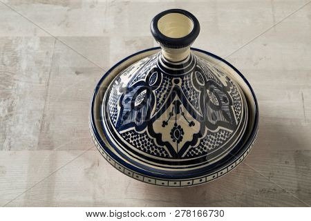 Traditional blue decorated Moroccan tagine made in Safi