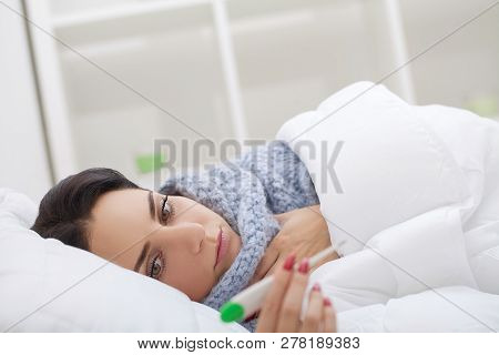 Cold And Flu. Woman Sleep And Hold Her Head With Subliminal Stress Or Other Possible Symptoms