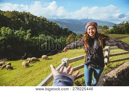 Couple Asians Travel Nature In The Holiday. Hold Hands Running Happy Enjoy Nature On The Mountain At