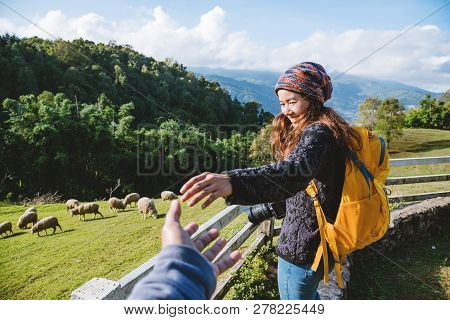 Couple Asians Travel Nature In The Holiday. Hold Hands Running Happy Enjoy Nature On The Mountain At