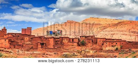 Old Berber Architecture In High Atlas Mountains Region In Morocco. Houses Of Clay At The Foot Of The
