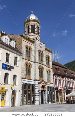 Brasov, Romania - April 28, 2018:  Brasov Street View, Piraeus Bank On The Left