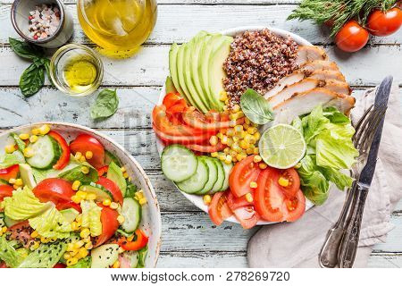 Healthy Salad Bowl With Quinoa, Tomato Turkey, Avocado, Sweet Pepper, Corn, Lime And Mixed Greens, T