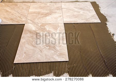 Ceramic Tiles And Tools For Tiler. Floor Tiles Installation. Home Improvement, Renovation - Ceramic 