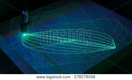 Big Pendulum Draws Ellipses With Light On Phosphorus Surface. Science, Physics And Experiment Concep